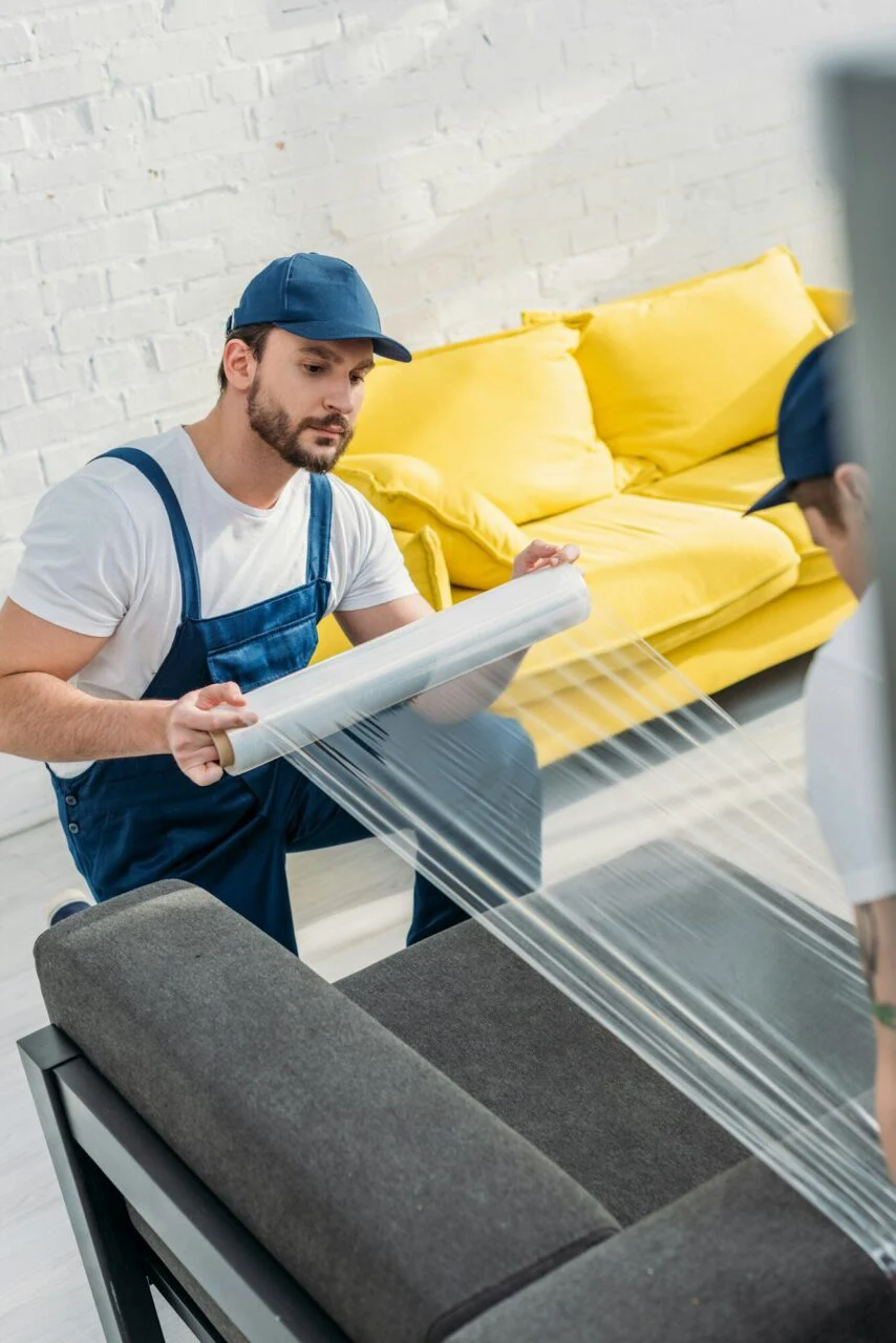 Men packing the Household item 
