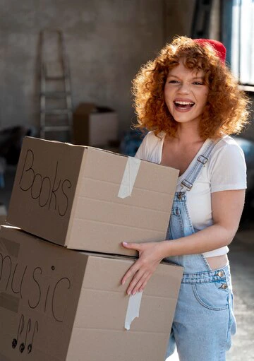woman-handling-belongings Woman Professional moving Household Items